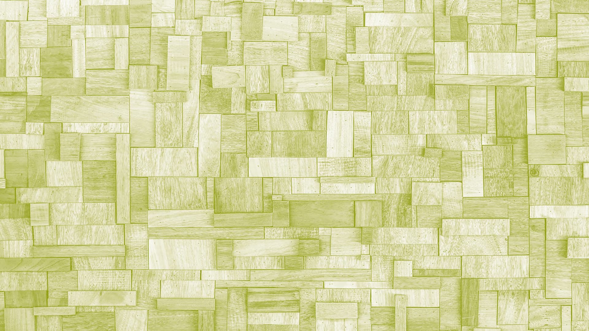 A textured background of various green-tinted wooden planks arranged in a patchwork pattern.