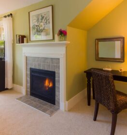 The fireplace is cozy and warm in one of the guest rooms at the Greenlake Guest House